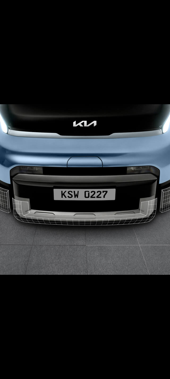Nahaufnahme der Frontstoßstange des Kia PV5 Passenger mit dreiteiliger Reparaturstruktur.